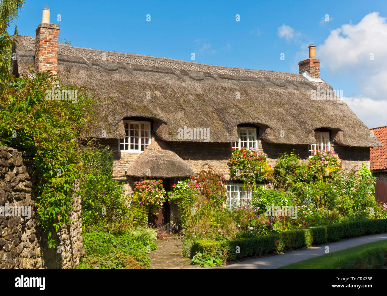 thornton-le-dale traditional thatched cottage north yorkshire england uk gb eu europe Stock Photo