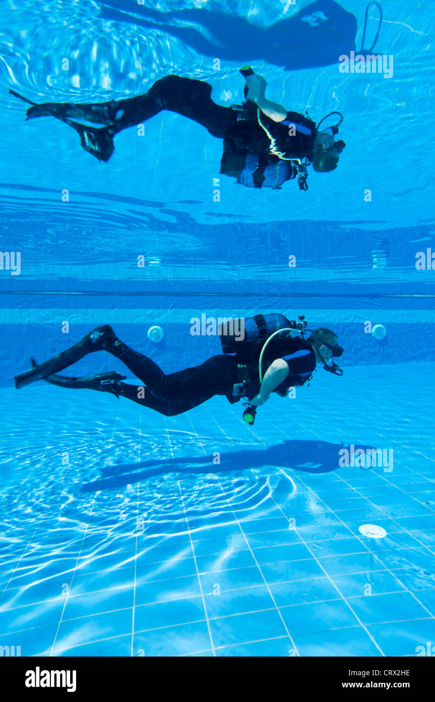 Learning to Scuba Dive in a Swimming Pool Stock Photo