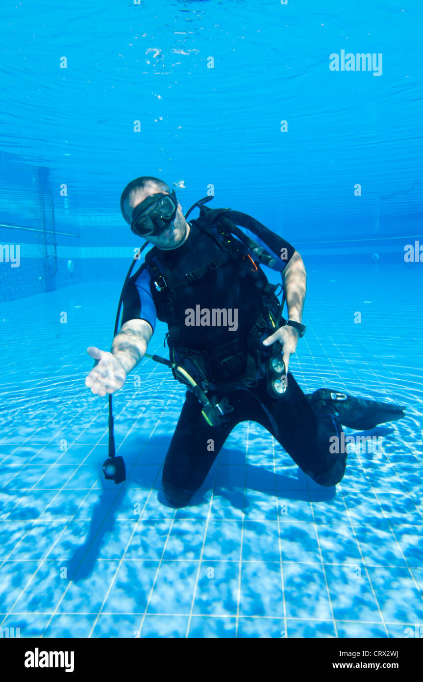Learning to Scuba Dive in a Swimming Pool Stock Photo