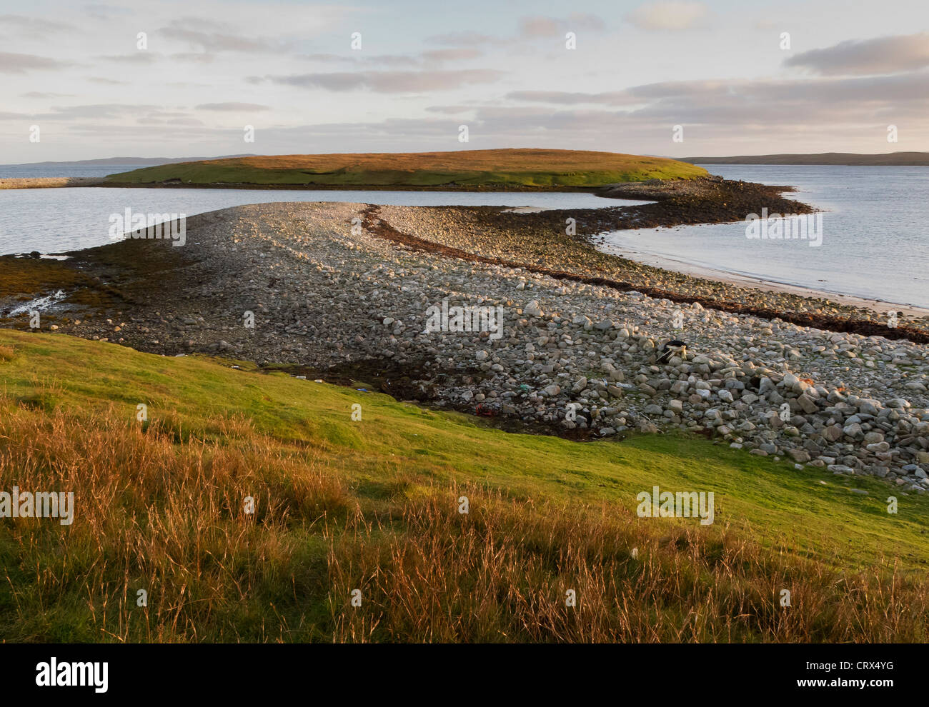 The Holm of Coppister on the island of Yell, Shetland, showing shingle tombolo. October 2010. Stock Photo