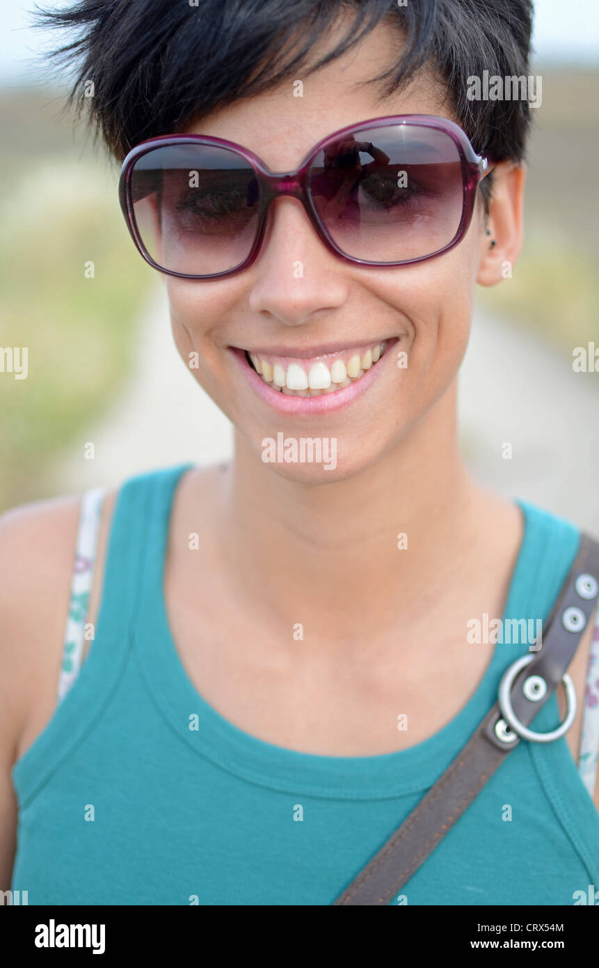 Attractive short haired girl in nature Stock Photo Alamy