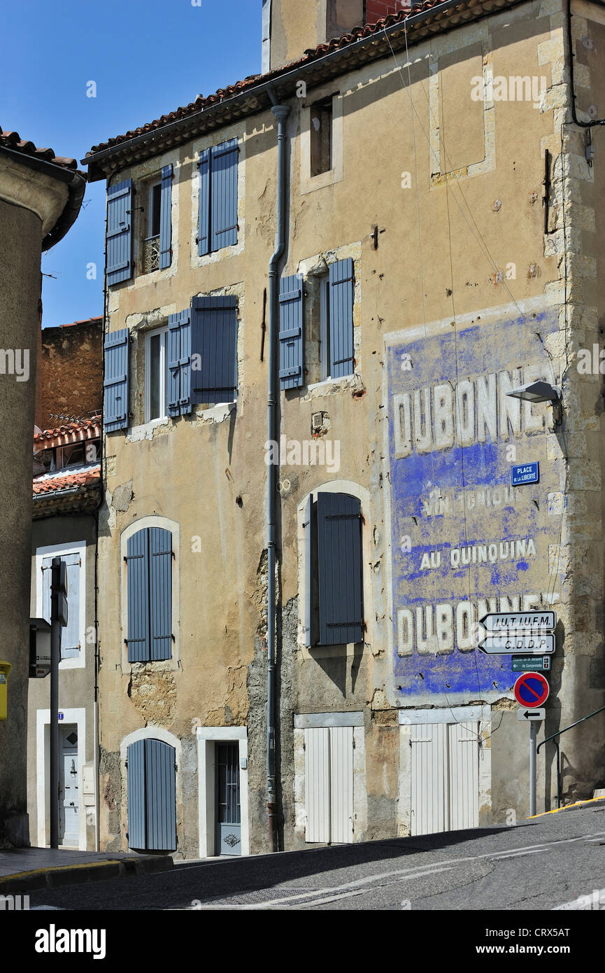 Old billboard advertisement for the apéritif Dubonnet painted on house front at Auch, Gers, Midi-Pyrénées, Pyrenees, France Stock Photo