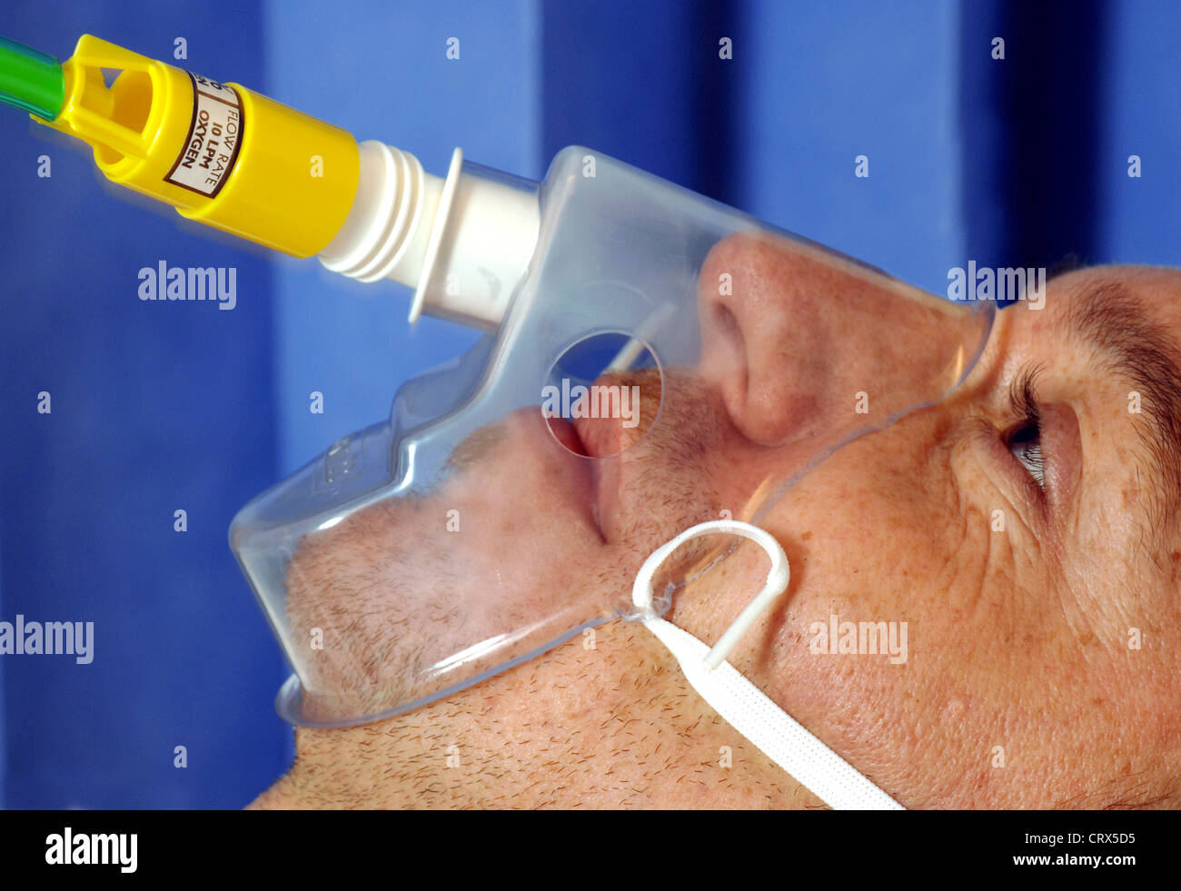 Close up of a man wearing an oxygen mask Stock Photo Alamy