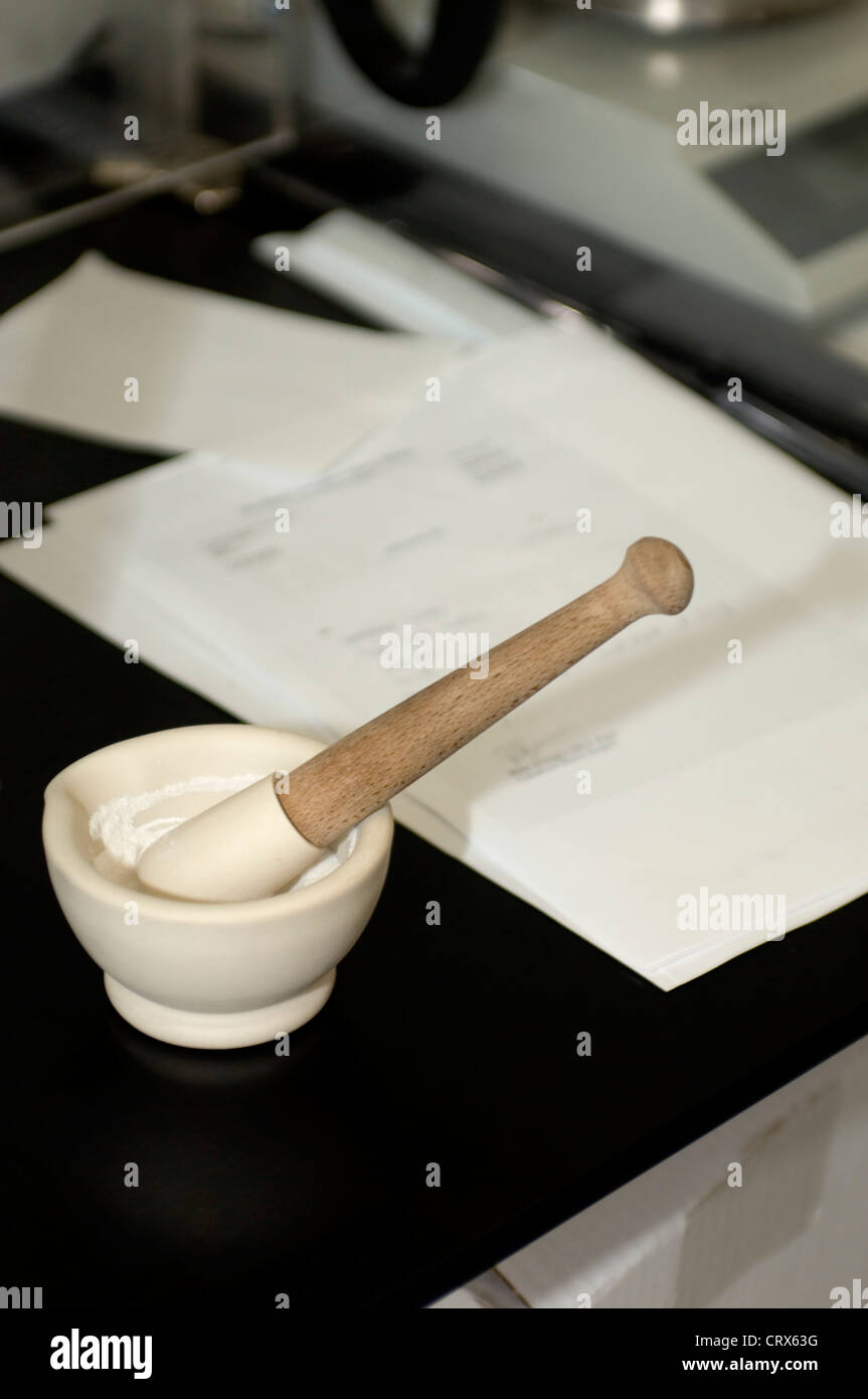 A skin ointment by prepared in a pestle & mortar in a hospital pharmacy Stock Photo