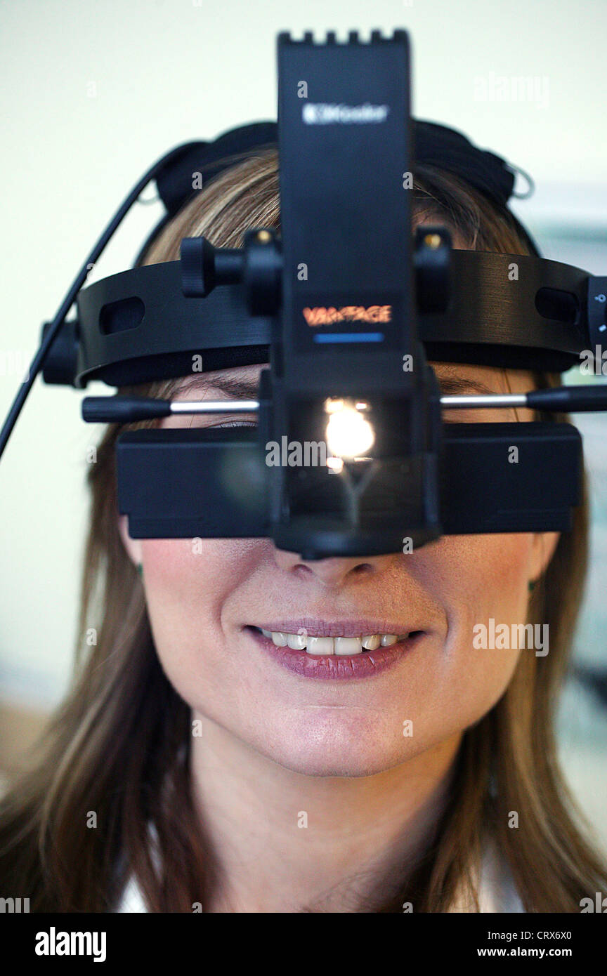 Ophthalmologist wears an indirect ophthalmoscope Stock Photo Alamy