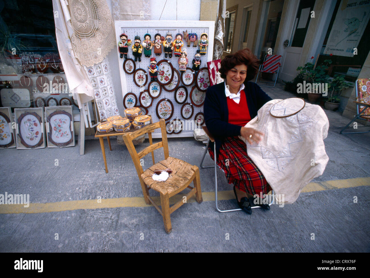 Lefkara Cyprus Handmade Lace Woman Sewing On Chair In Street Stock Photo