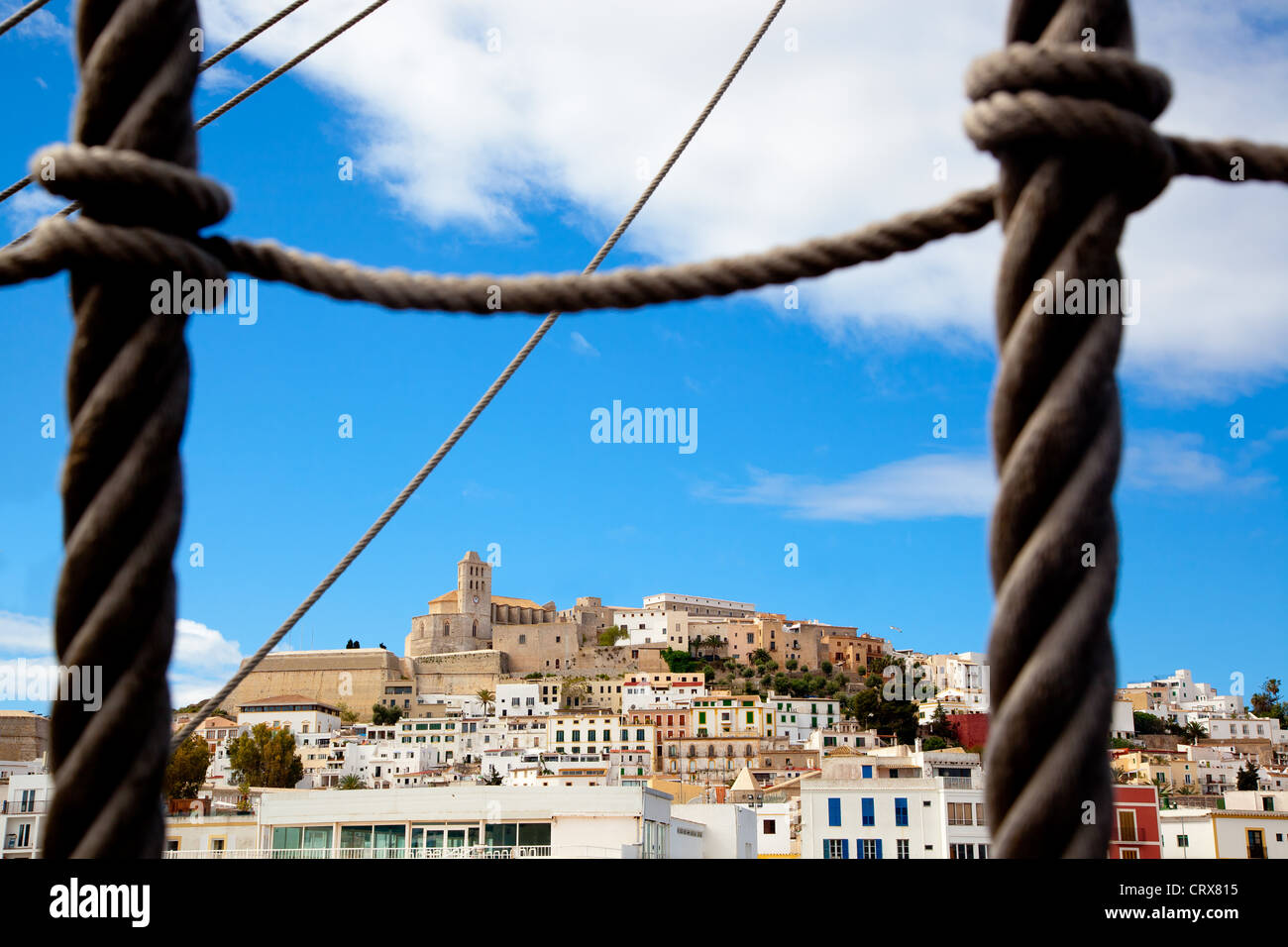 Eivissa Ibiza town with view prom boat rope ladder summer blue sky Stock Photo