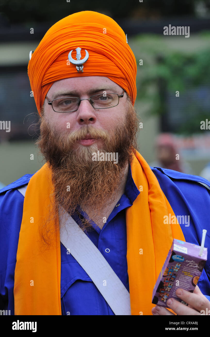 White male wearing a Chand Tora Dumalla at the 2012 Mela in Glasgow. Stock Photo