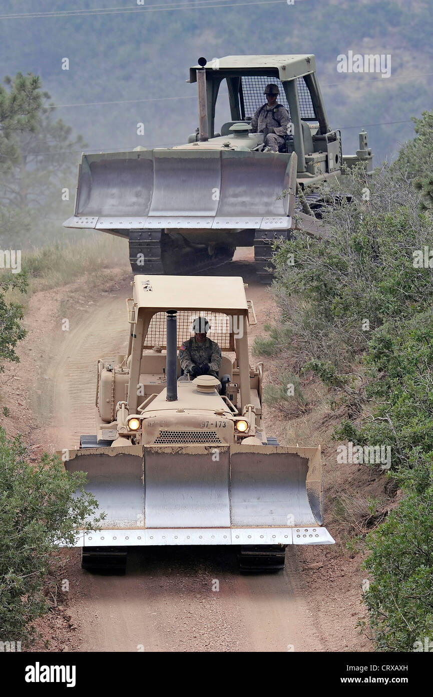 Heavy equipment from US Army base Fort Carson assists the Waldo Canyon Fire firefighting efforts