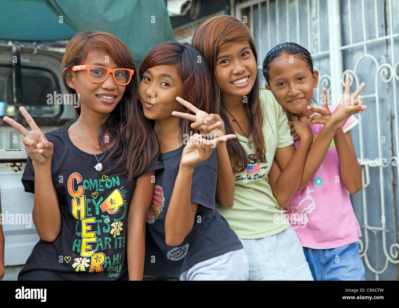 Happy children - preteens and young teens in Bogo City, Philippines. Stock Photo