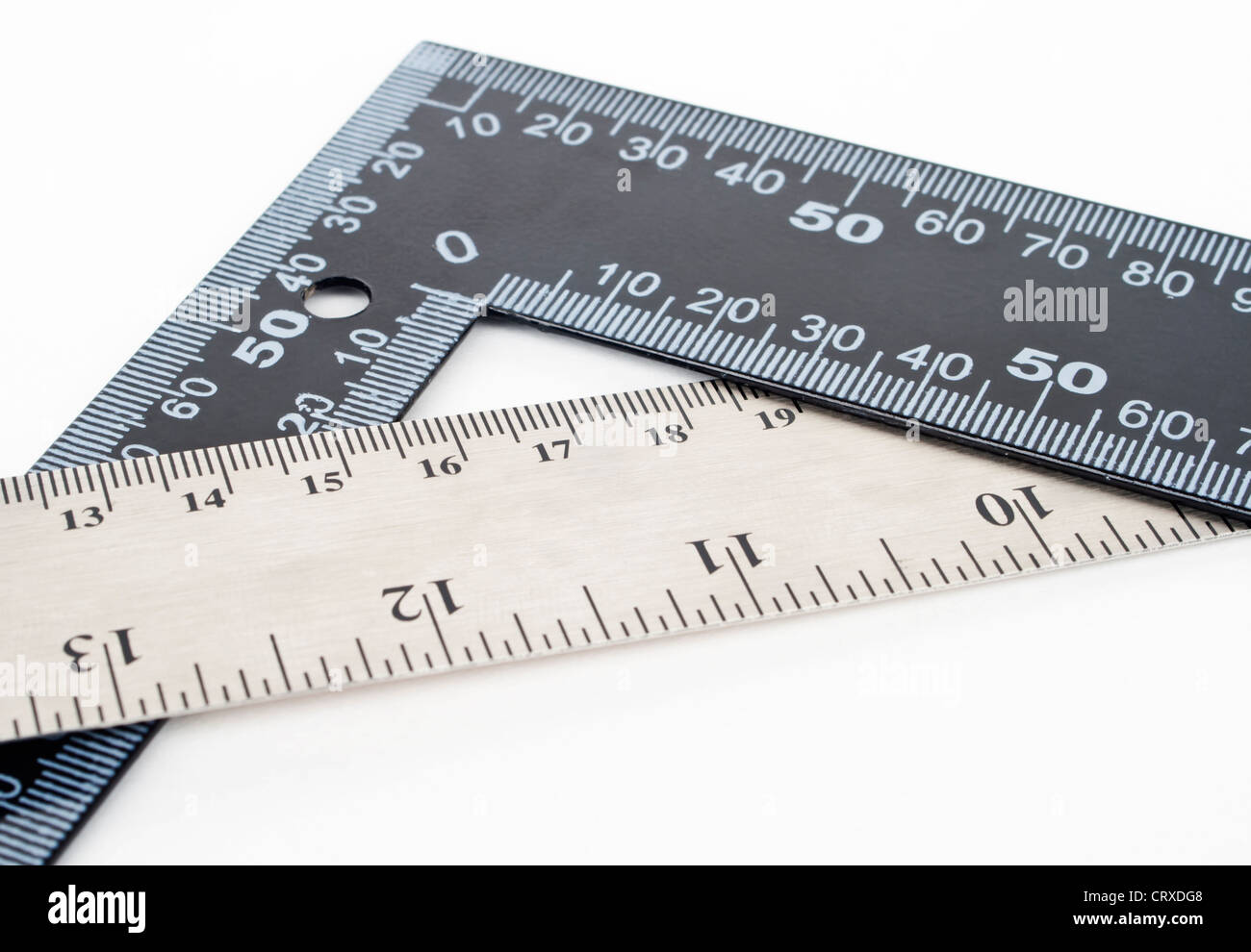 Black and silver metal measurement rulers on isolated on white background with copy space. Stock Photo