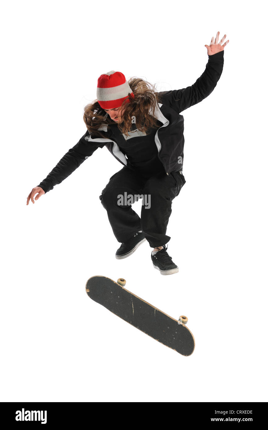Skateboarder jumping isolated over white background Stock Photo