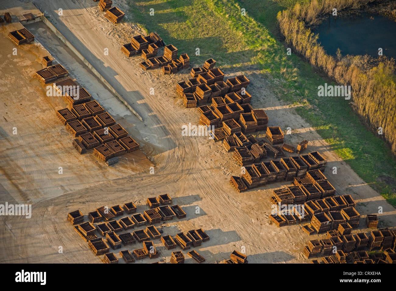 Part bins lined up outside closed foundary in Michigan, USA Stock Photo