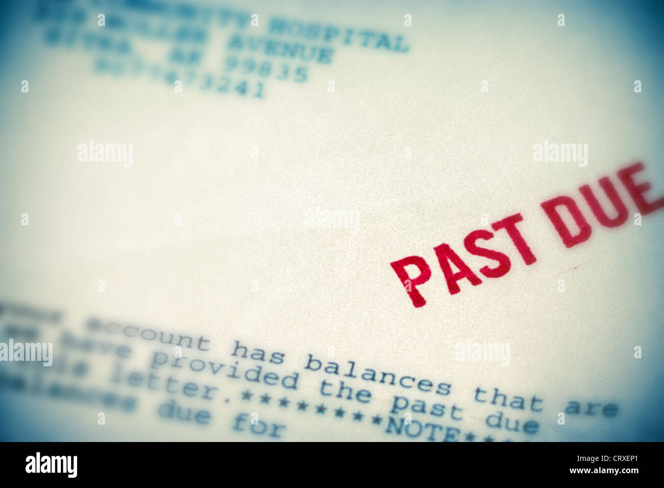 Close up of overdue hospital bill with red 'Past Due' stamp Stock Photo