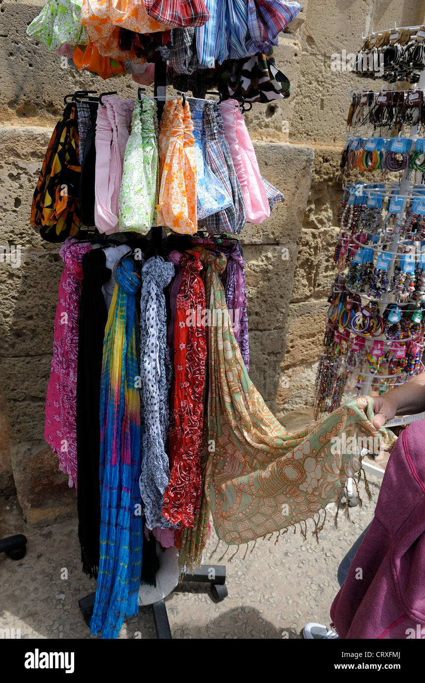 a stand full of colorful scarves menorca spain Stock Photo