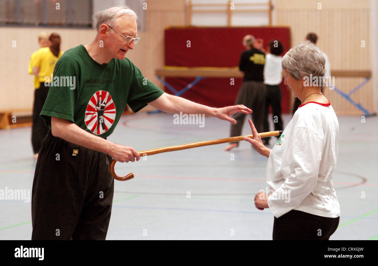 Stick fighting hi-res stock photography and images - Alamy