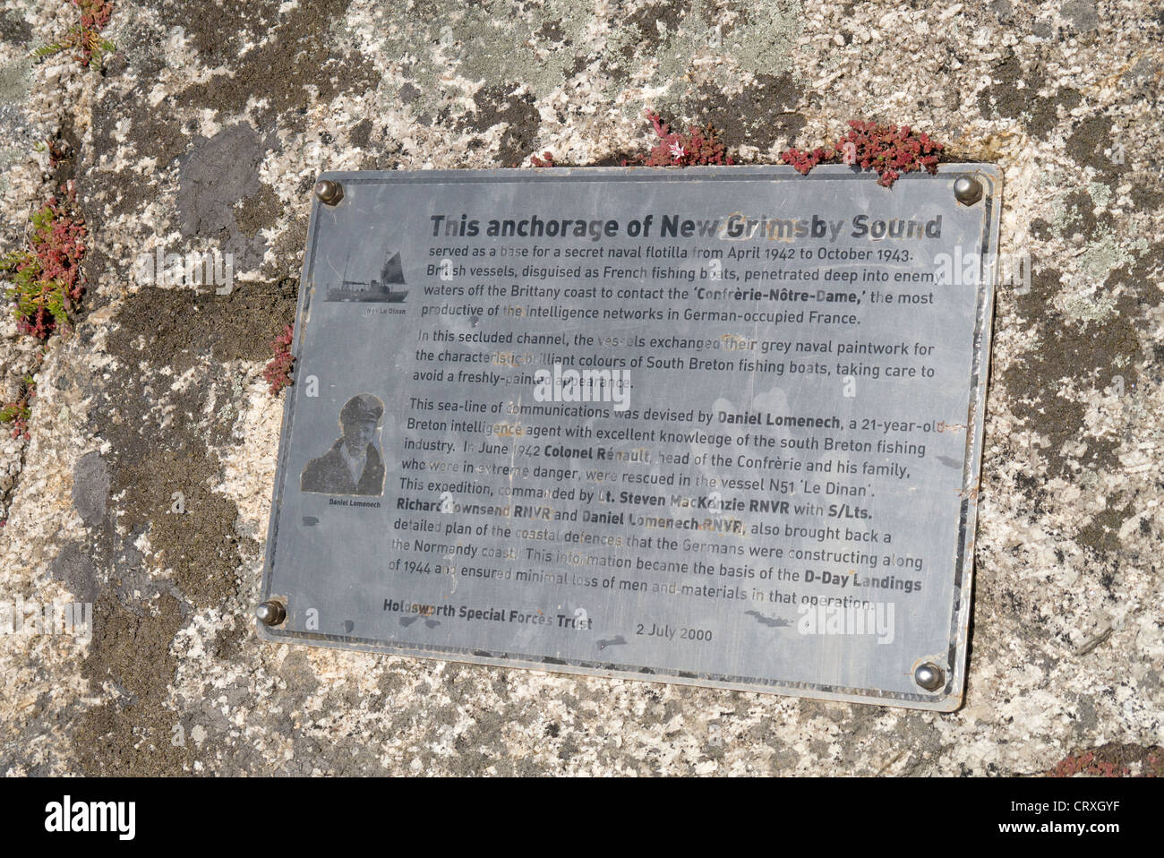 Plaque commemorating the secret Naval flotillas that sailed from Tresco, Isles of Scilly to Nazi-occupied Brittany in WW2. Stock Photo