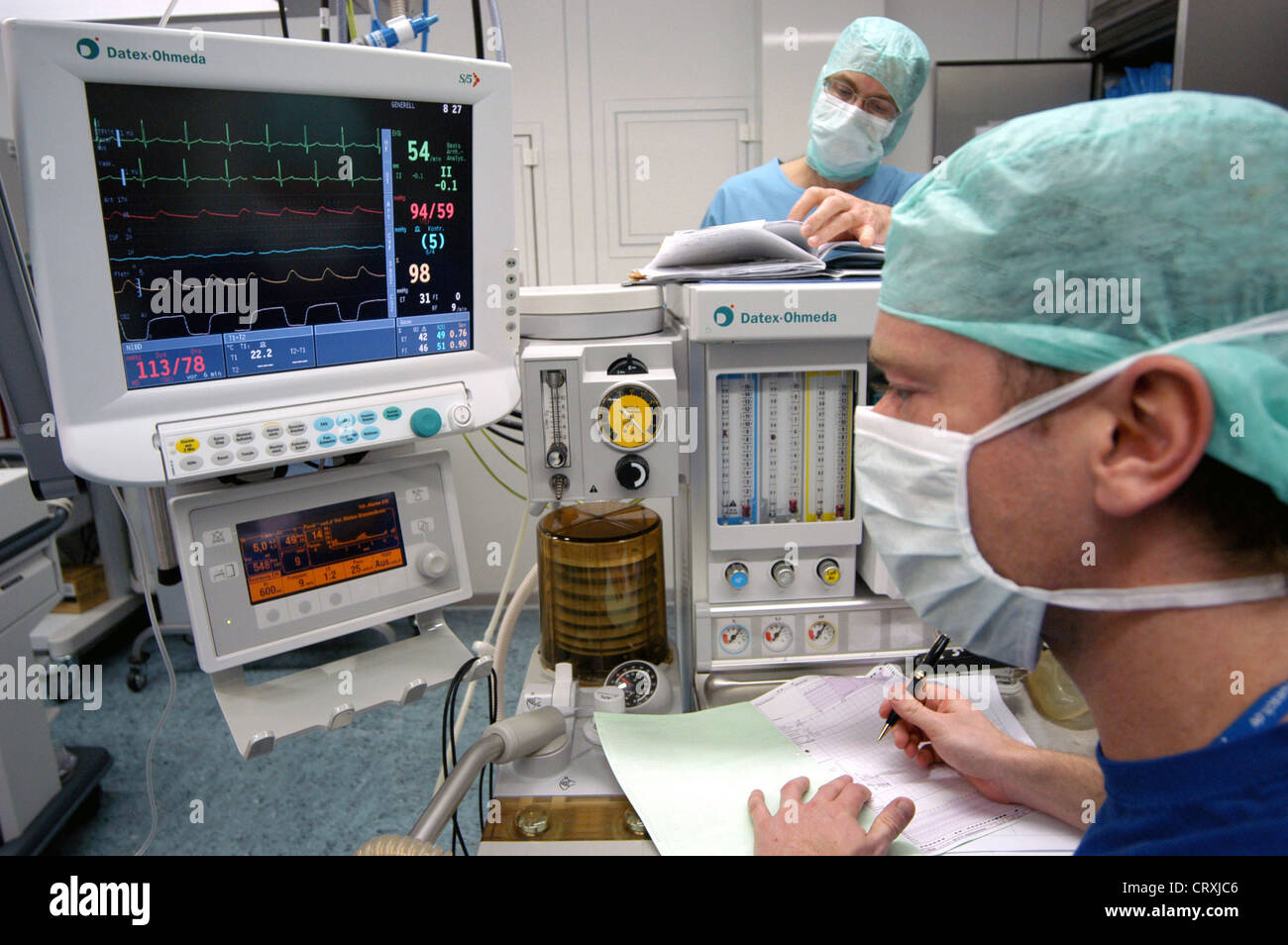 Anesthesiology in the monitoring of a patient Stock Photo - Alamy