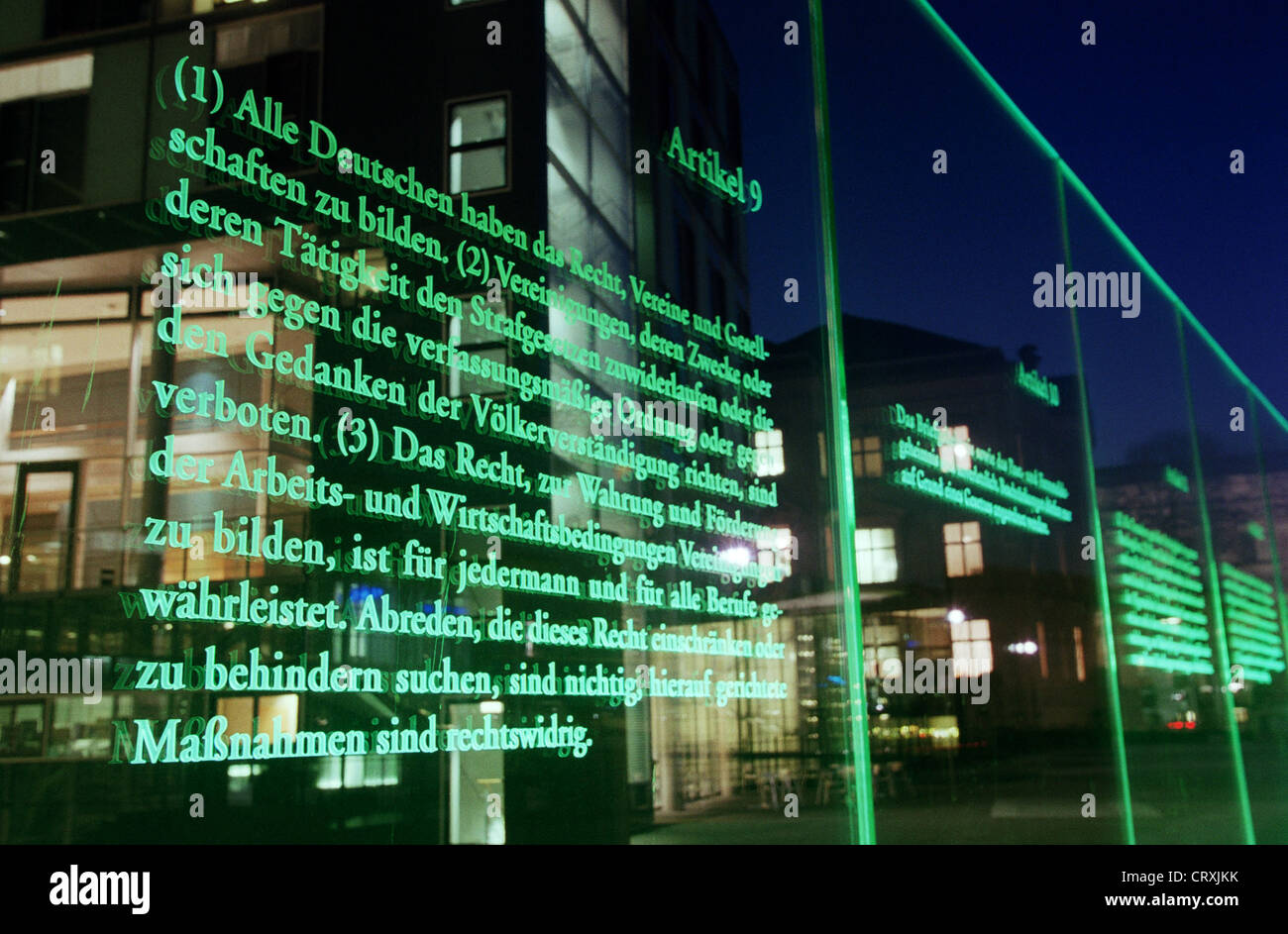 Illuminated glass panel with the nine articles of the Basic Law Stock Photo