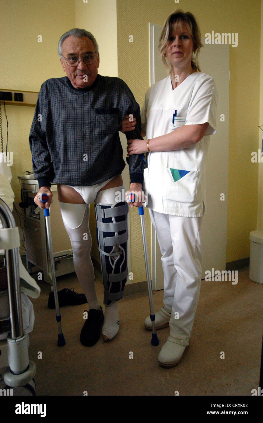 Patient when getting up after knee surgery Stock Photo Alamy