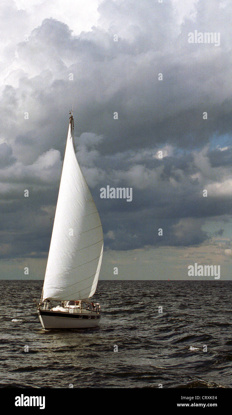 Sailboat and clouds Stock Photo