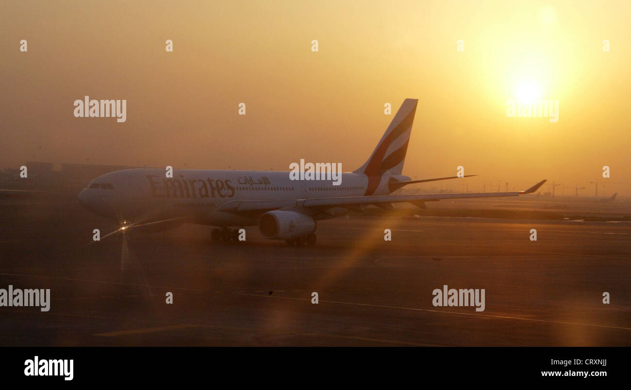 An Emirates Airlines plane before the Dubai airport Stock Photo