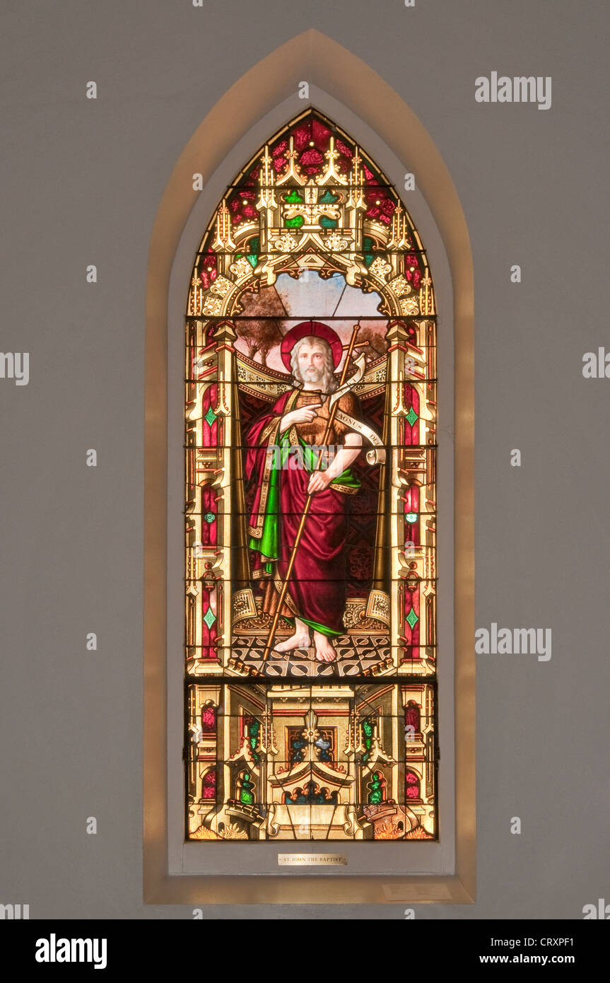 St. John the Baptist, stained glass window in St. Louis Catholic Church, built 1870, in Castroville, Texas, USA Stock Photo