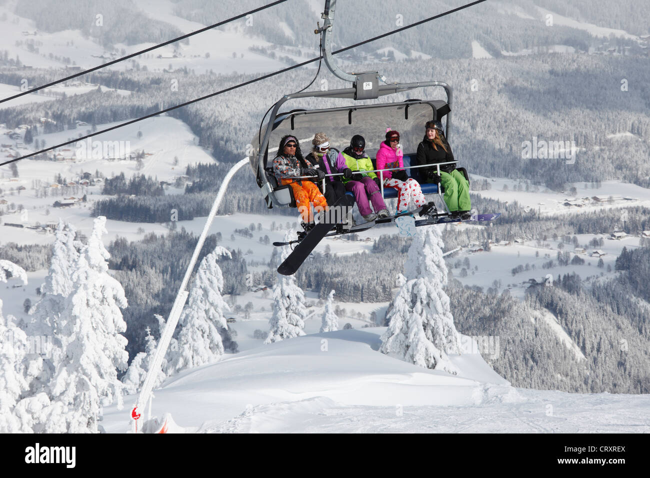 Austria, Styria, Schladminger Tauern, People in chair lift Stock Photo