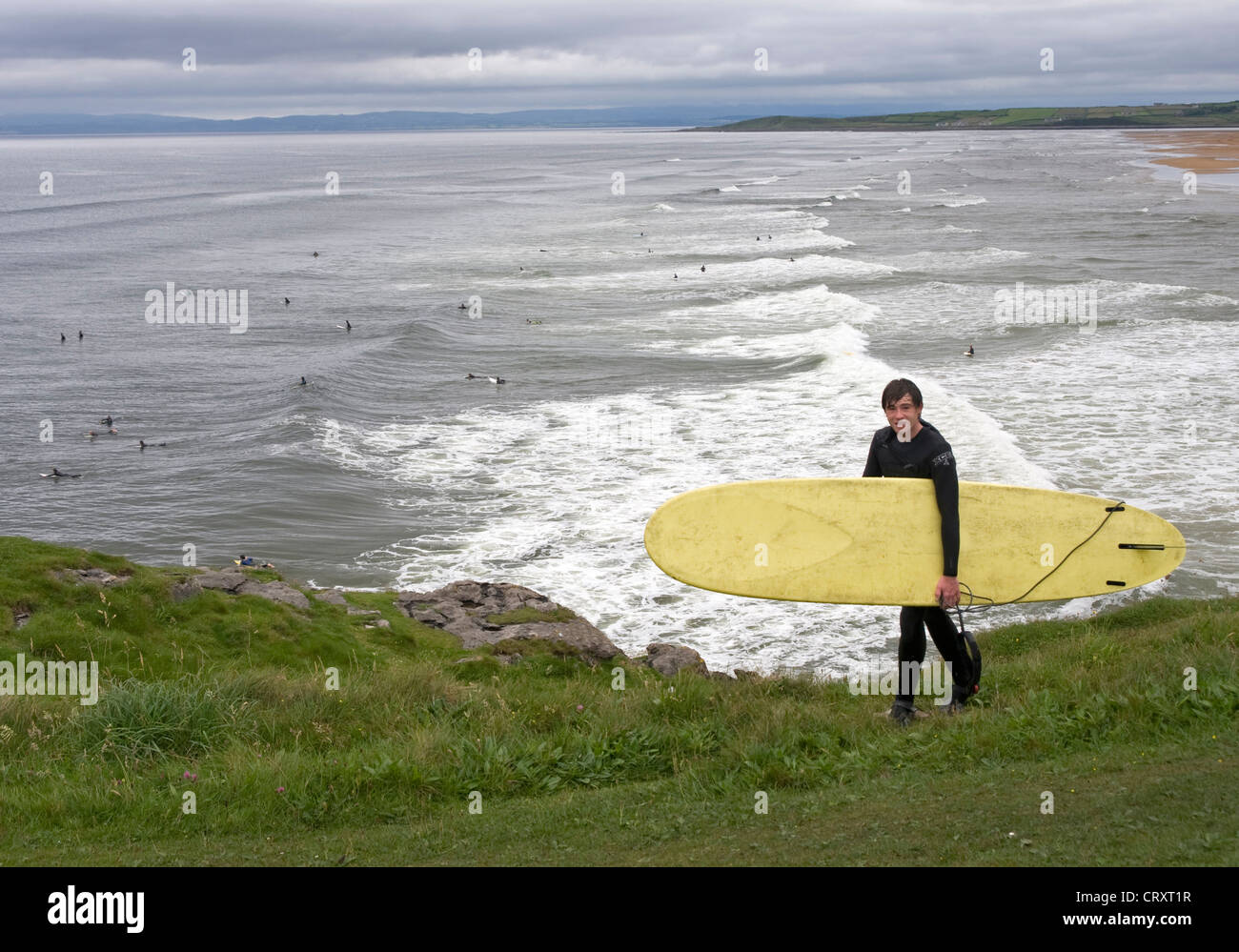 Young surfer at the Fairy Bridges, Bundoran, Donegal Stock Photo