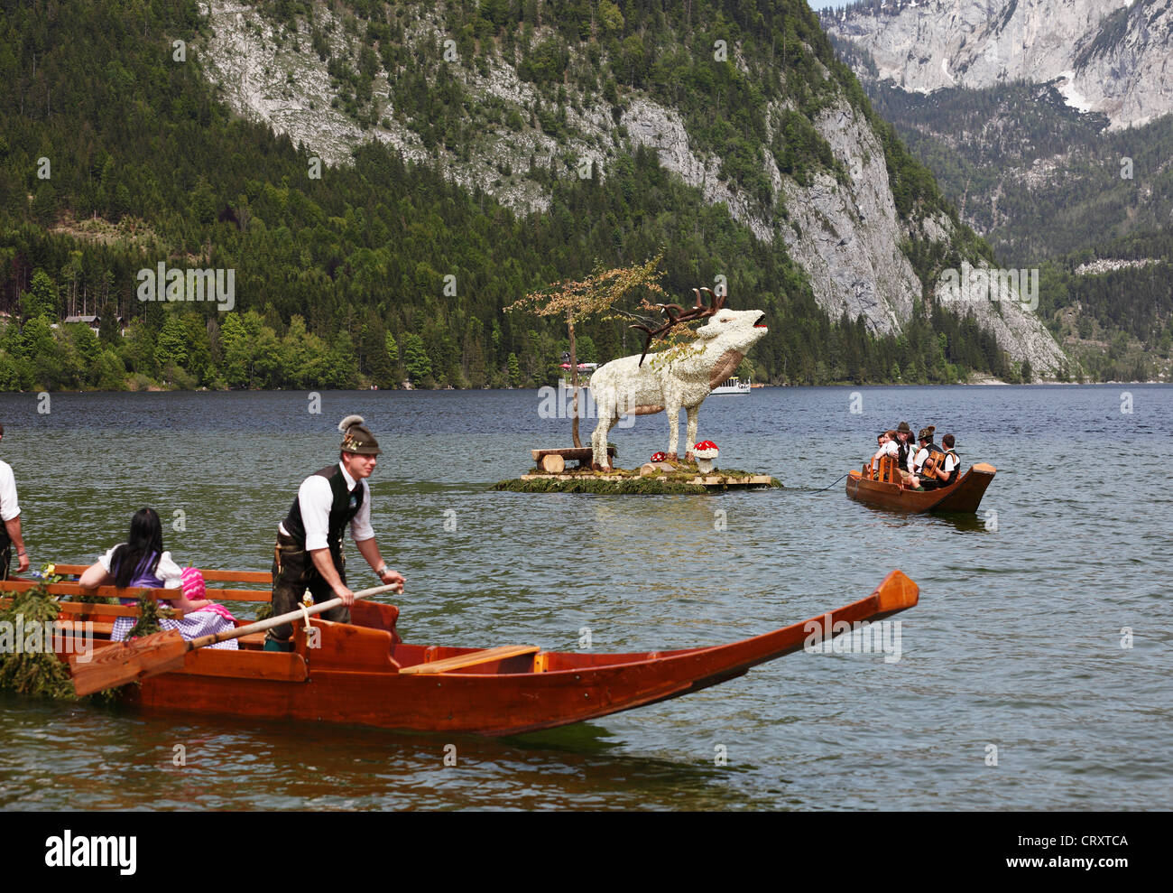 Austria, Styria, People celebrating daffodil festival on Lake Altaussee