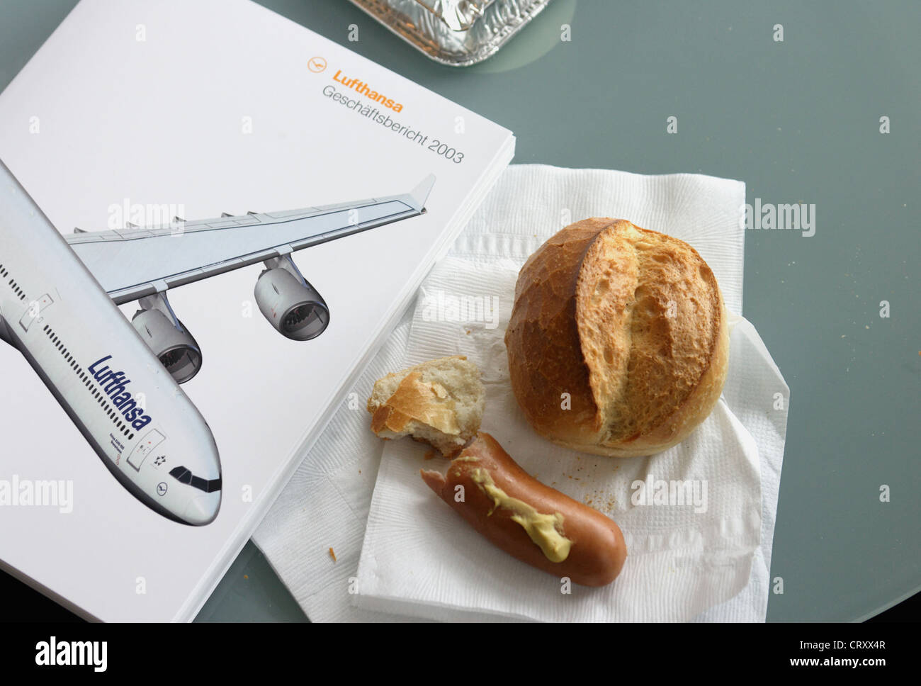 Half-eaten sausages with buns Lufthansa, HV Stock Photo
