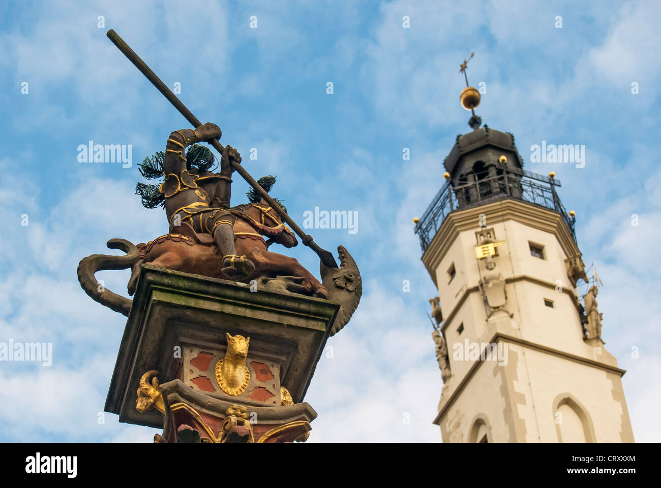 Column of St. George Fountain and Rathaus (Town Hall) Tower, Rothenburg ob der Tauber, Germany Stock Photo