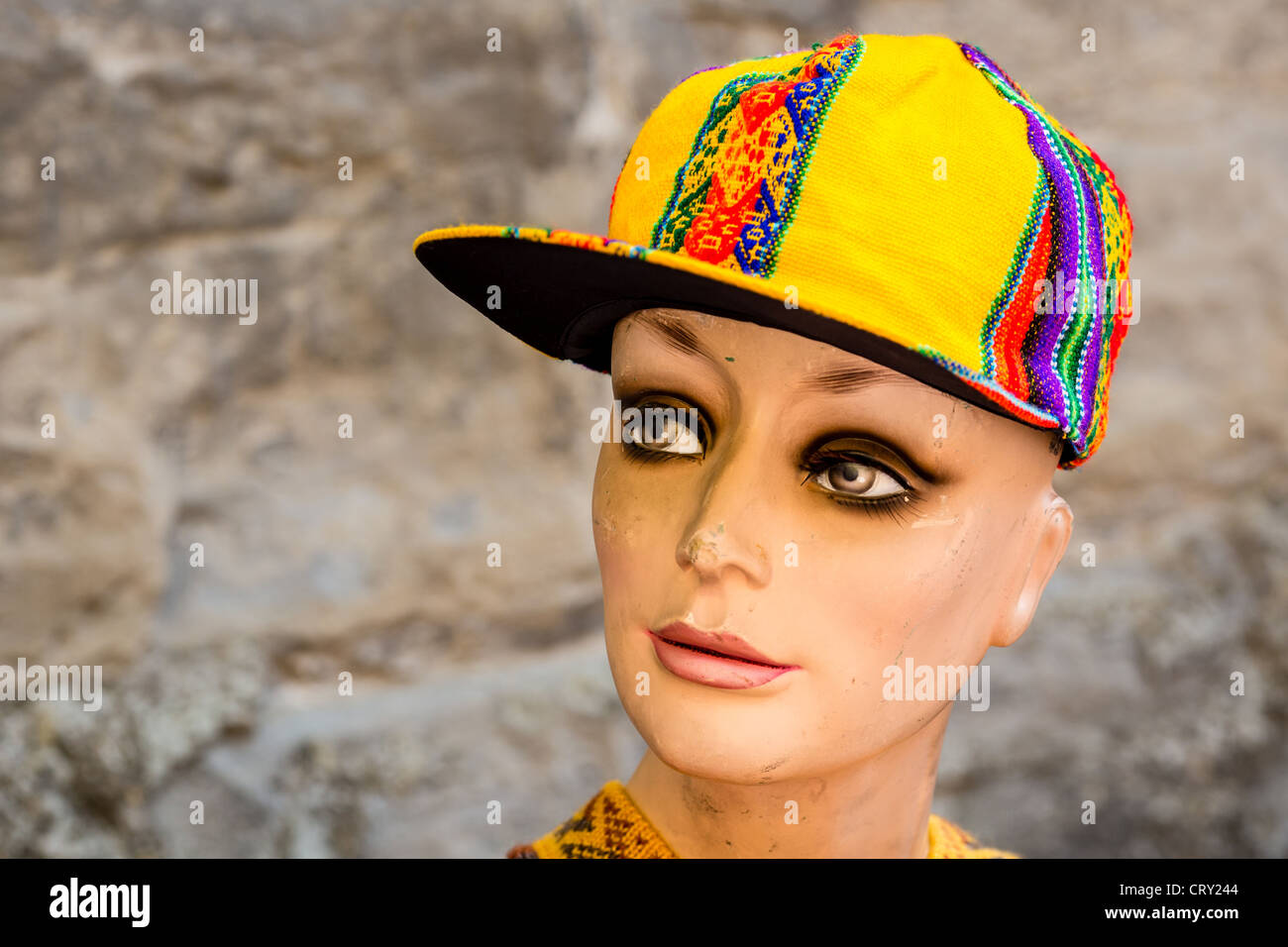 Female mannequin with yellow cap, Italy Stock Photo