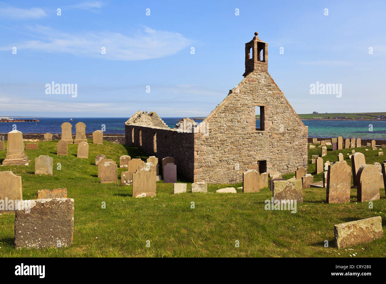 Ruins of Lady Kirk medieval parish church with gravestones in churchyard at Pierowall Westray Island Orkney Islands Scotland UK Stock Photo