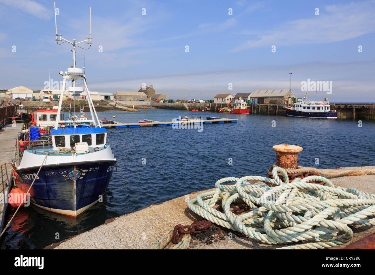 Boats in the small fishing harbour at Gill Pier, Pierowall, Westray Island, Orkney Islands, Scotland, UK, Britain Stock Photo