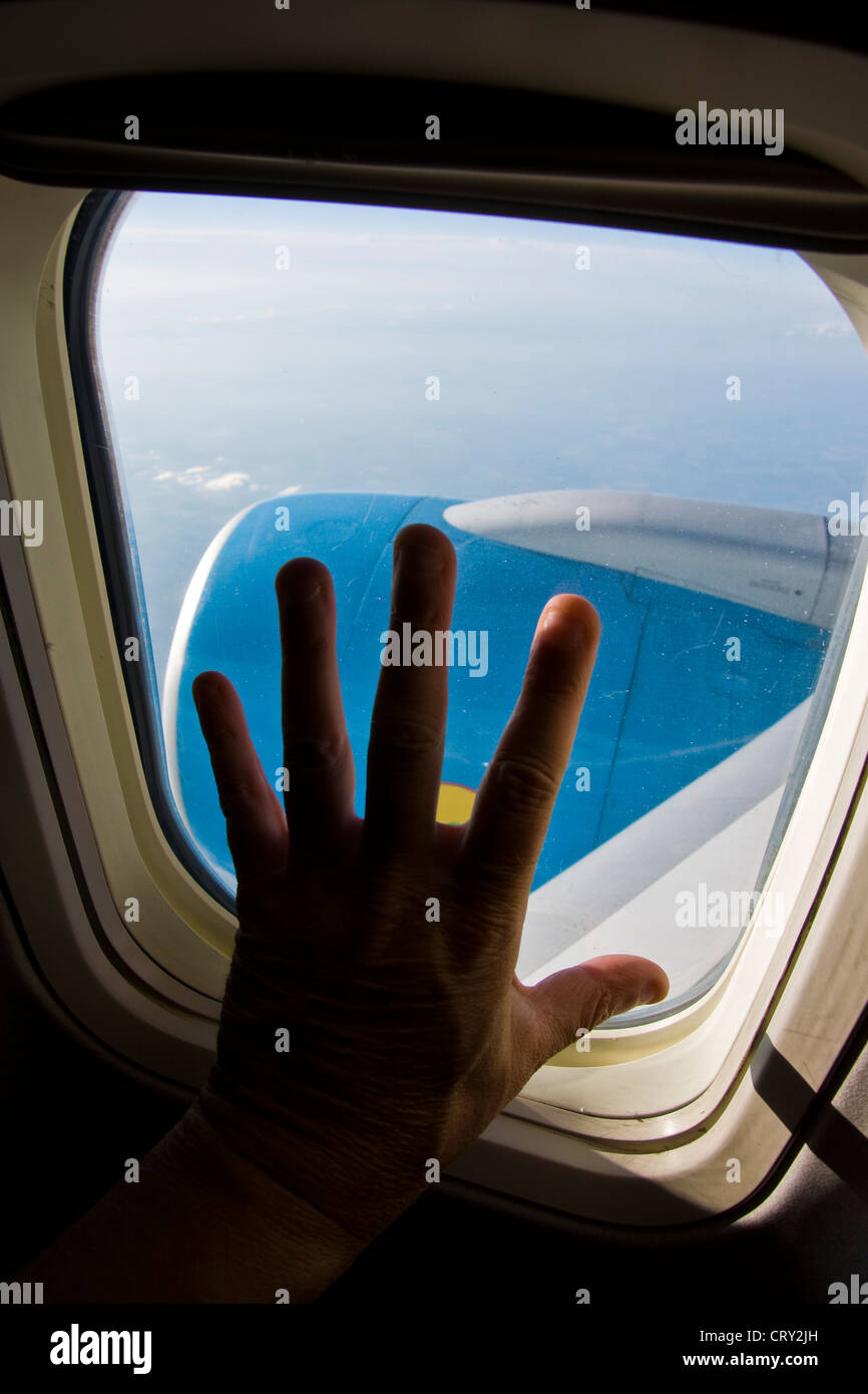 Fly from Tahkent to Milan Malpensa, Uzbekistan Airways, hand Stock Photo