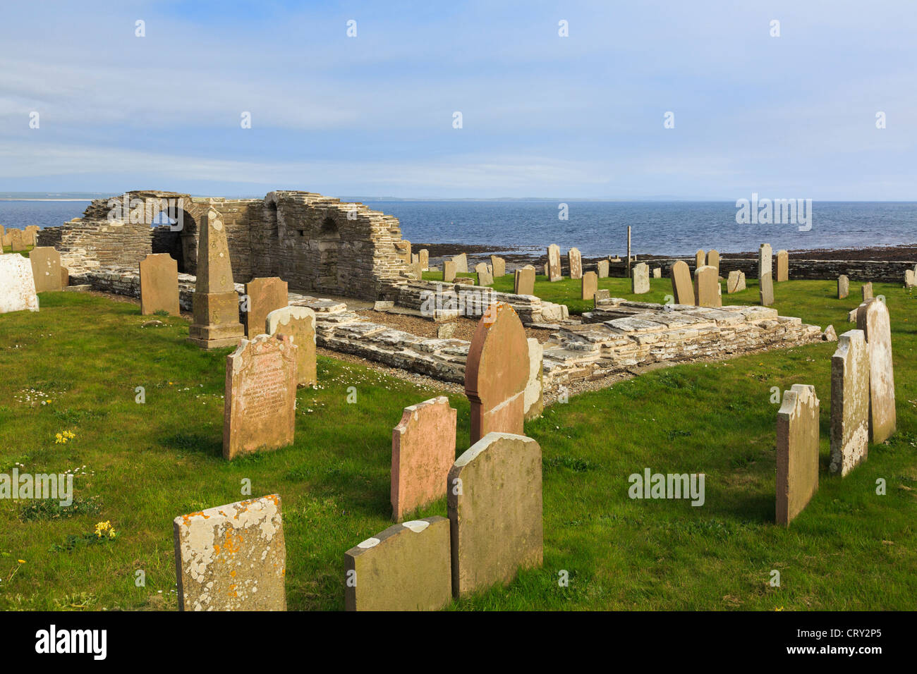 Cross Kirk church ruins with gravestones in the churchyard at Tuquoy, Westray Island, Orkney Islands, Scotland, UK Stock Photo