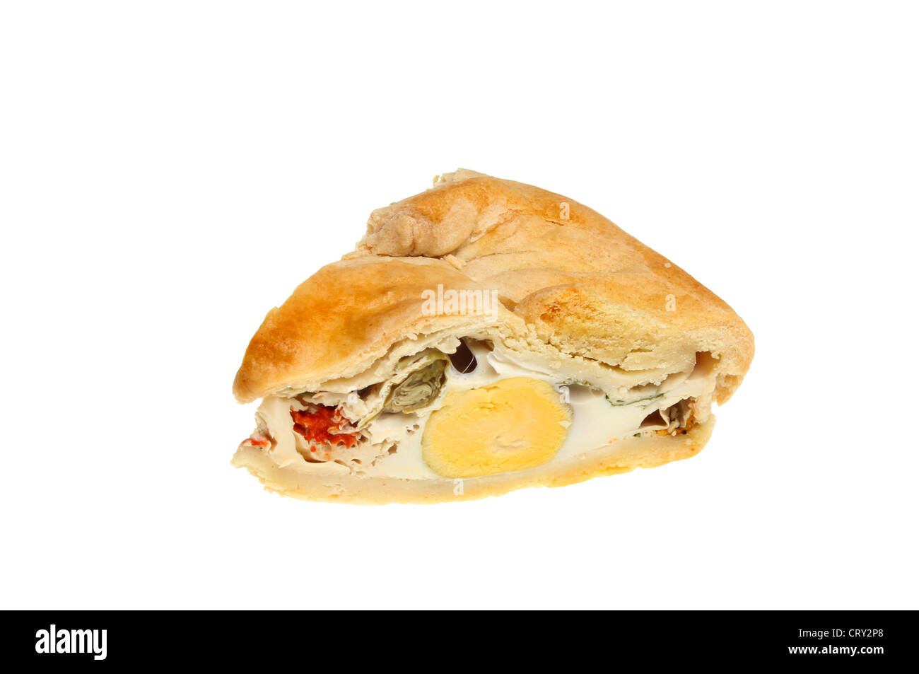 Portion of an egg and vegetable pie isolated against white Stock Photo