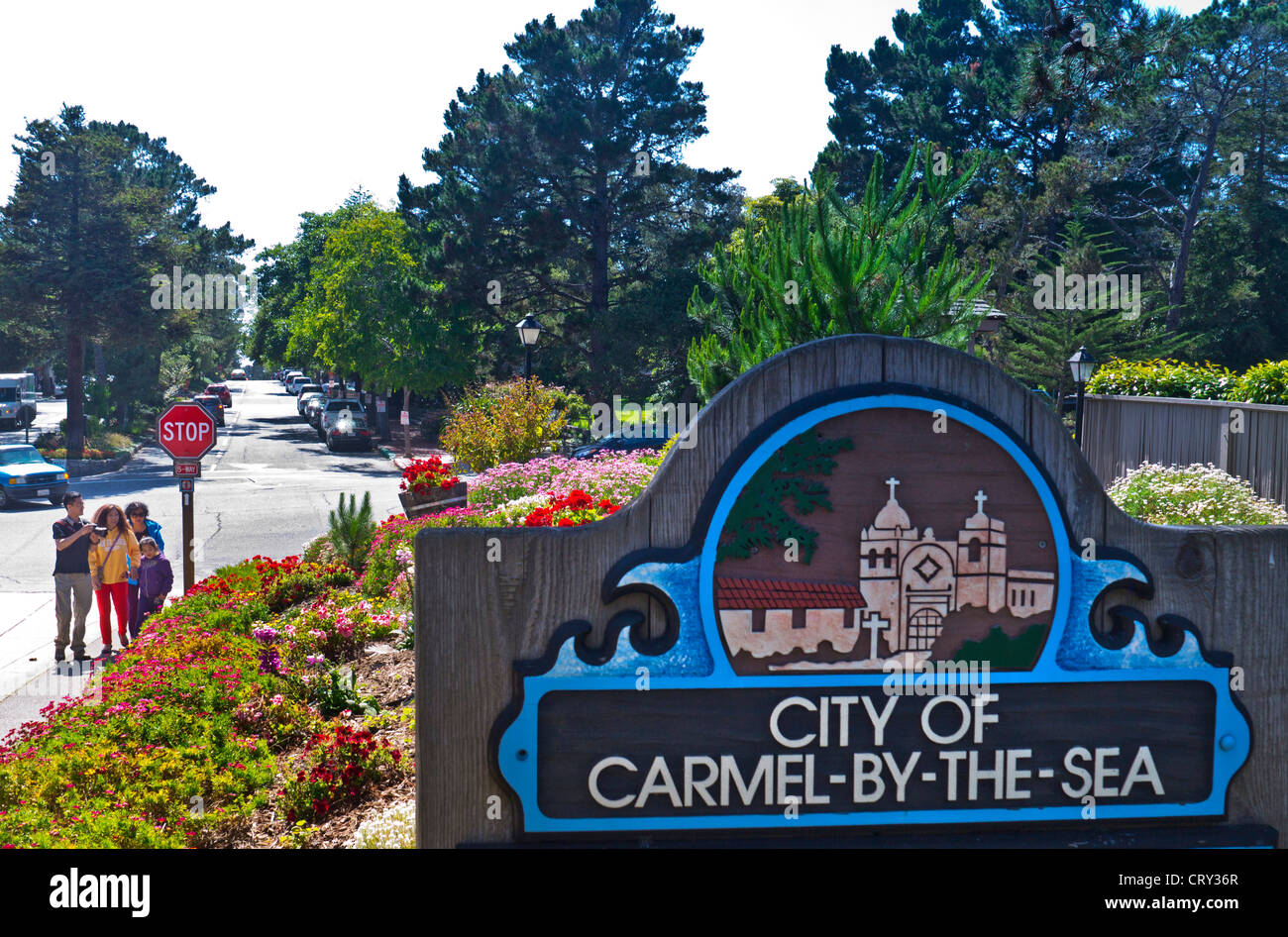 CARMEL BY THE SEA Sign at entrance to Carmel Village with tourist