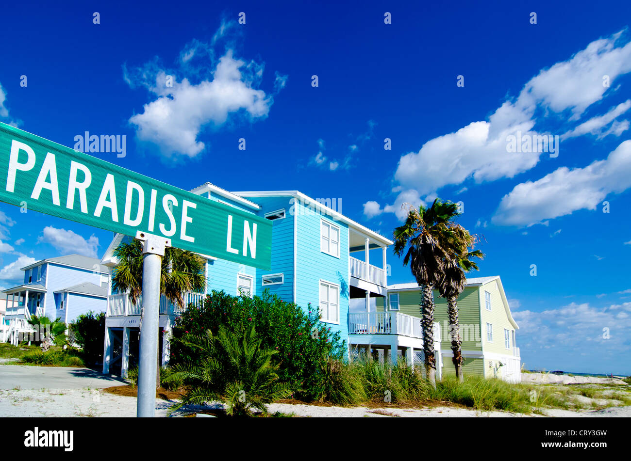 Paradise Lane Sign with Beach Homes in Background Stock Photo Alamy