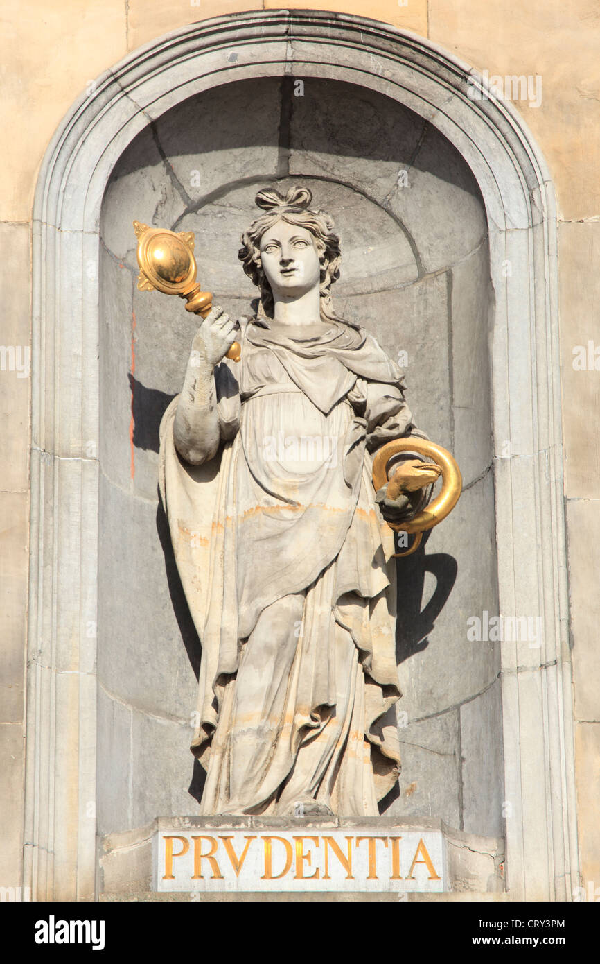 Statue of Lady Prudence inside a niche of the town hall in Antwerp, Belgium Stock Photo