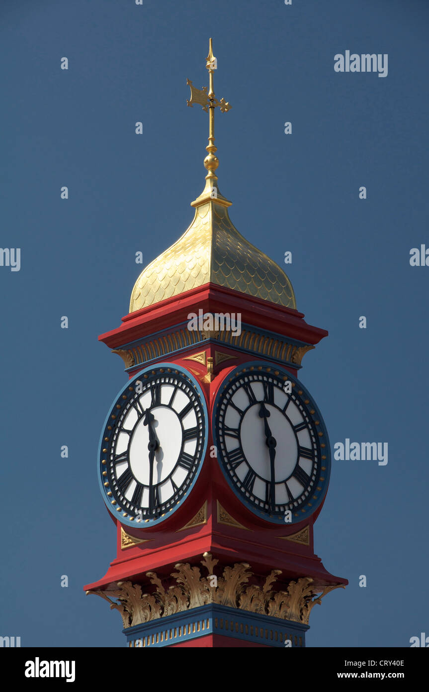 The freshly painted victorian Jubilee clock tower on Weymouth seafront was erected in 1887 to mark fifty years of Queen Victoria’s reign. Dorset, UK. Stock Photo