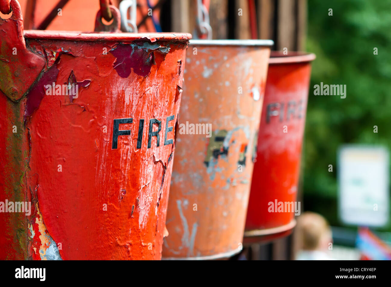a collection of three fire buckets at a steam railway station Stock
