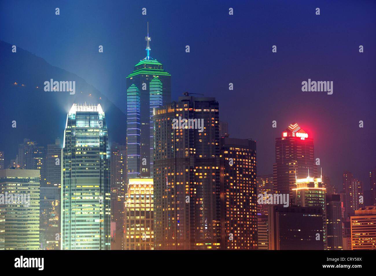 Hong Kong urban skyscrapers and city skyline at night Stock Photo - Alamy