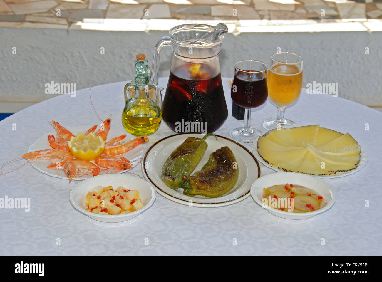 Tapas, King prawns, pointed fried peppers and Manchego cheese, Manchego cheese with chilli