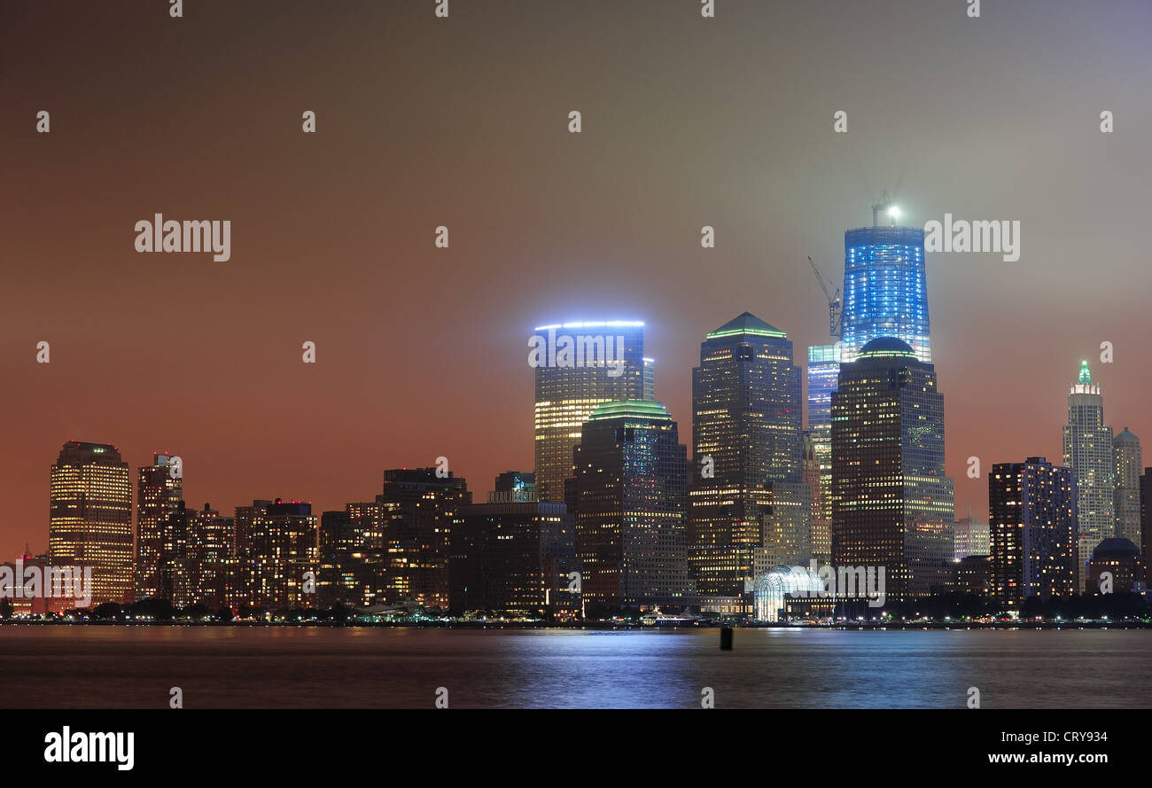 New York City Manhattan downtown skyline at night with skyscrapers over ...