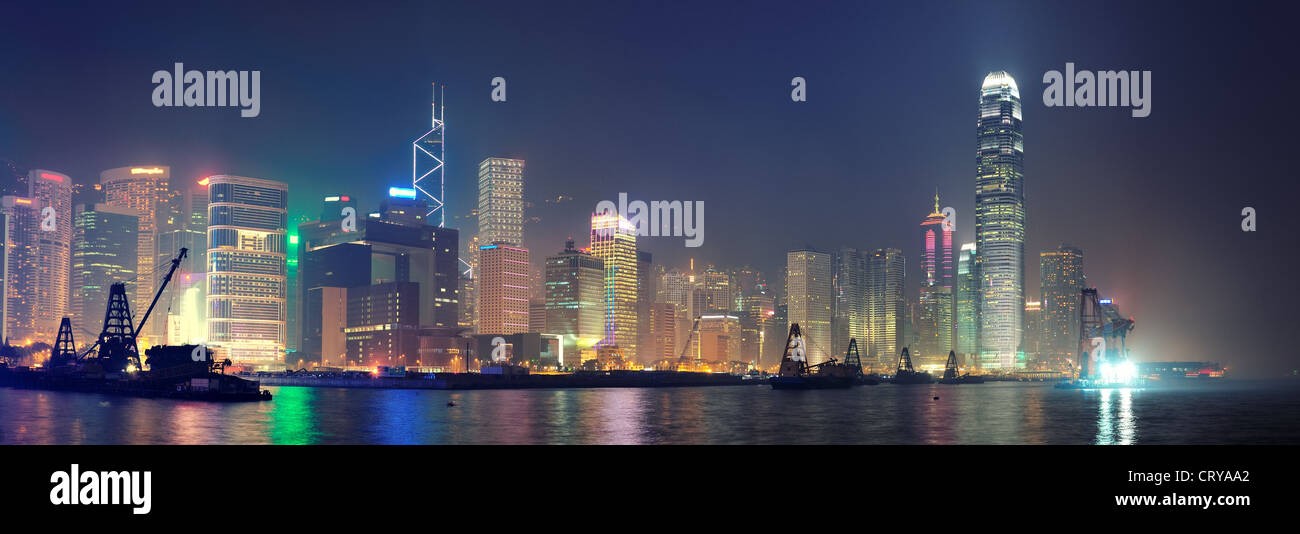 Hong Kong urban skyline panorama at night Stock Photo - Alamy