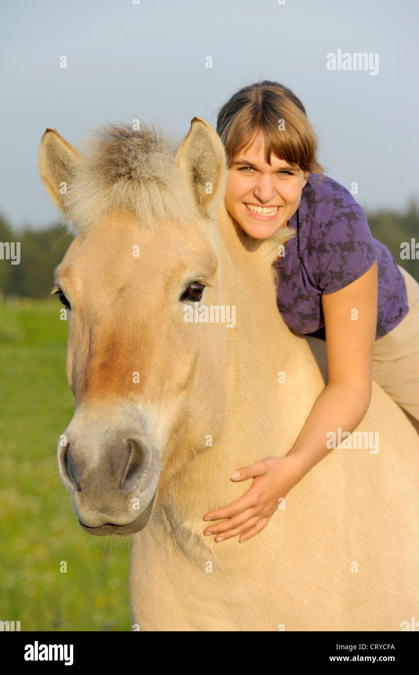 Girl with Norwegian Fjord Horse Stock Photo Alamy