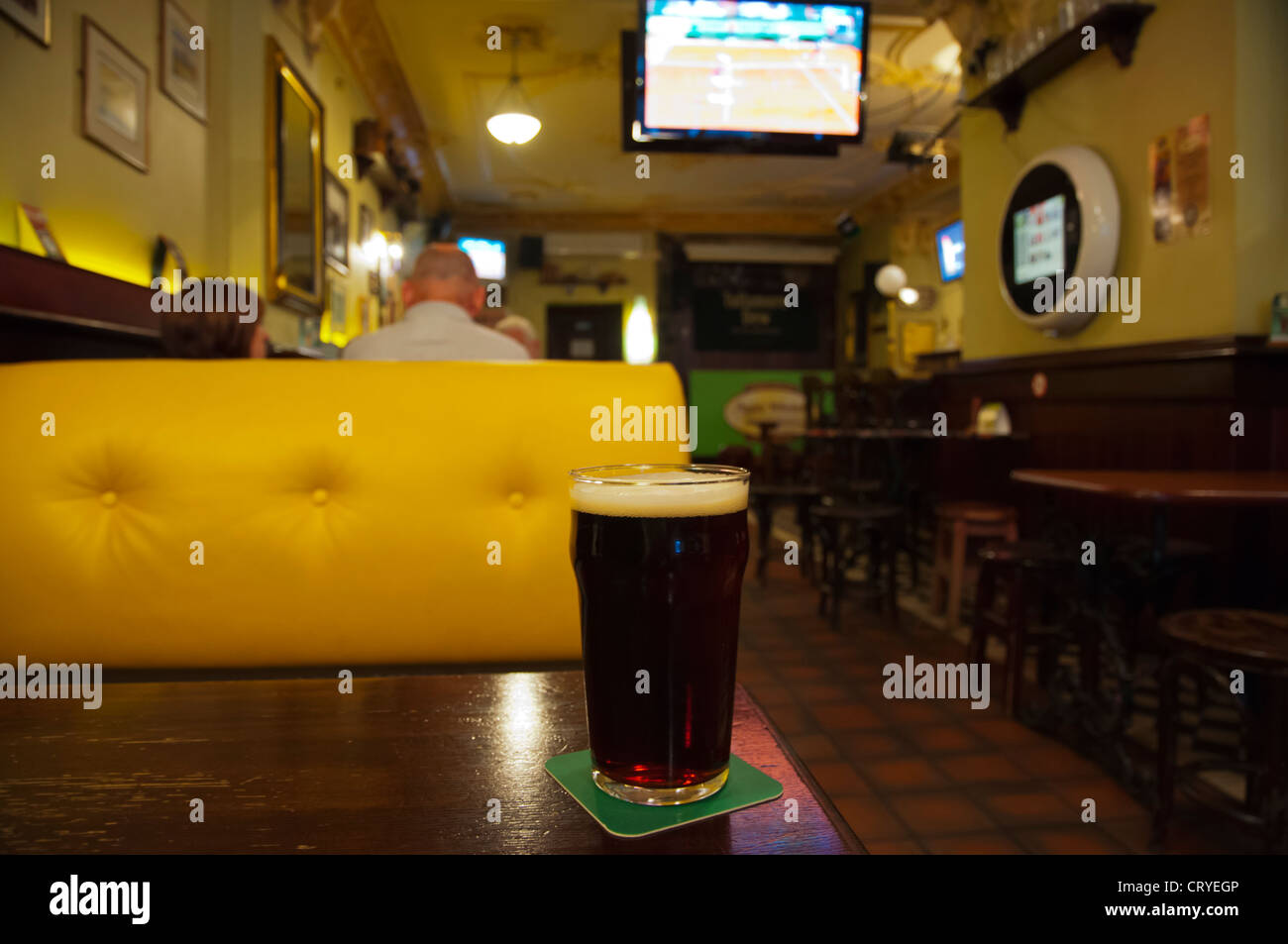 Pint of dark beer Paddy Wheelan's Irish pub old town Riga Latvia Europe Stock Photo