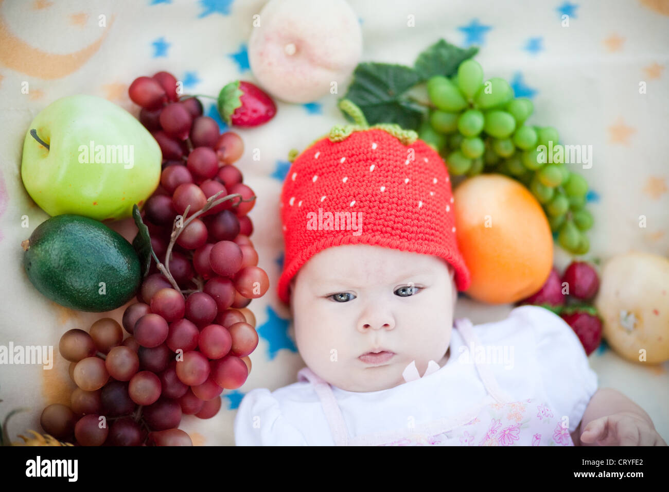 Adorable baby girl outdoors in the grass Stock Photo - Alamy